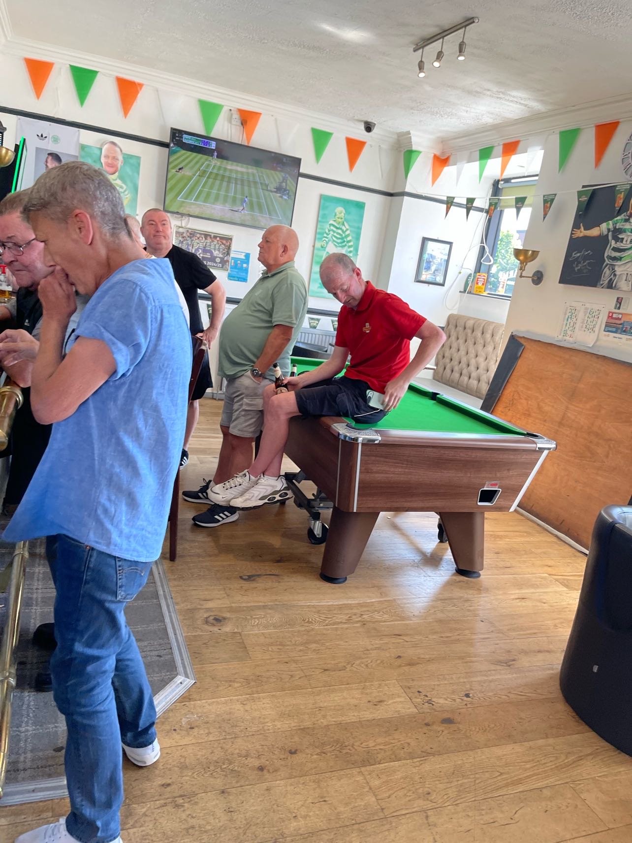 Pub seating area showing Celtic paraphernalia